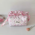 Bow Ruffle Quilted Makeup Pouch